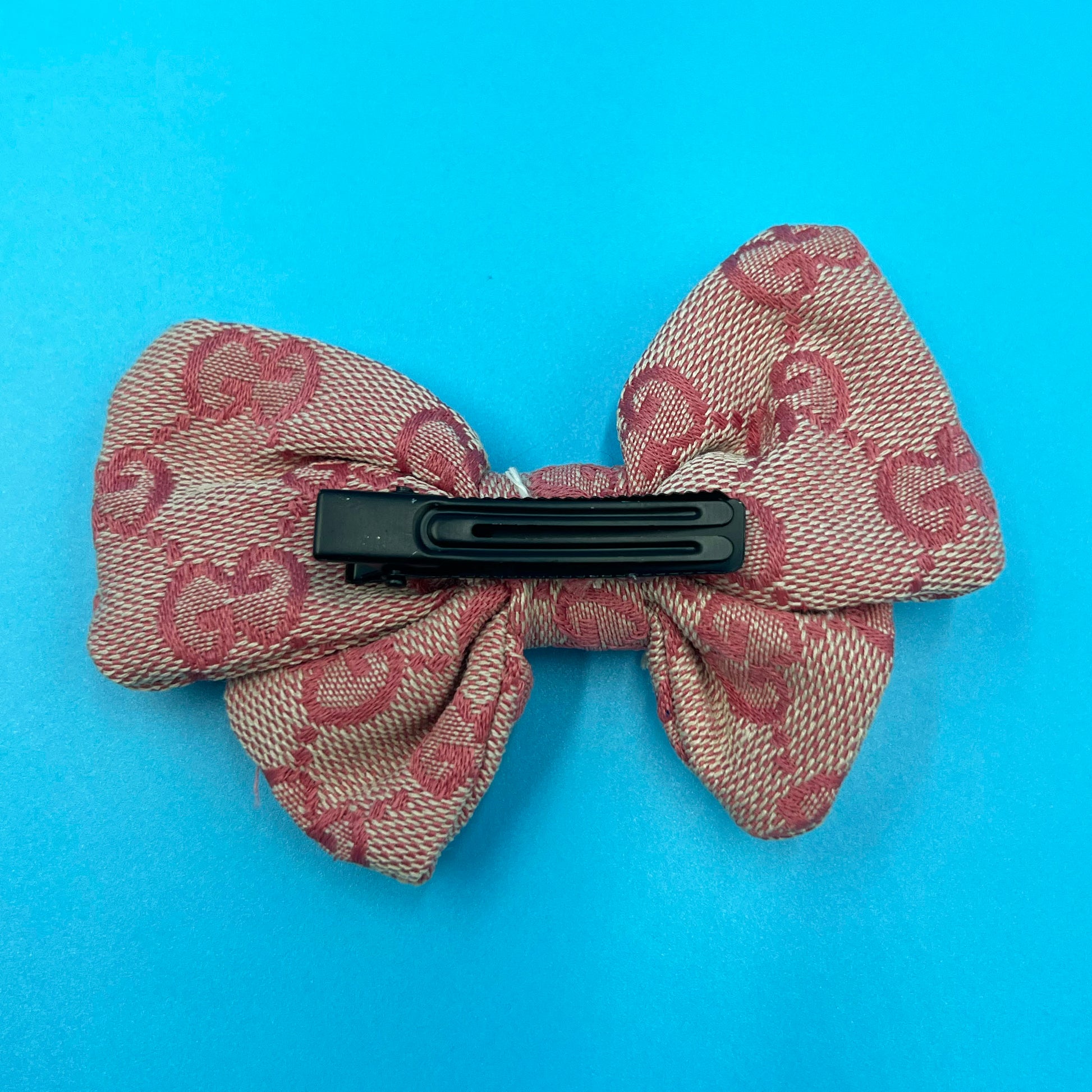 Pawcci Pearl monogram hair clip bearsupreme